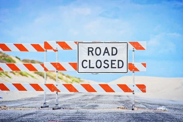 Road sign saying road closed
